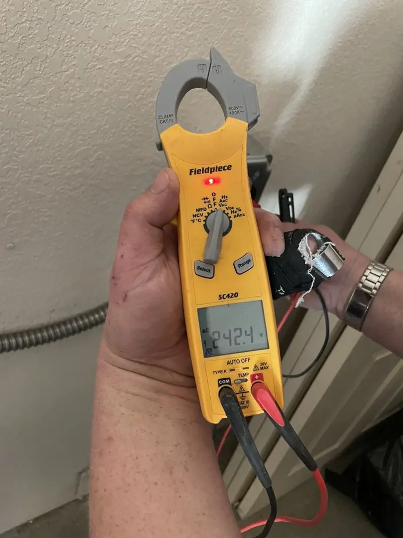 Voltage testing with clamp meter during Whole House Surge Protector in Nolanville